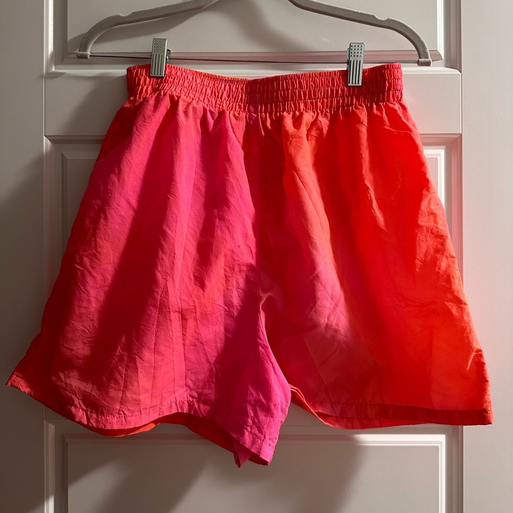 VINTAGE 80s pink and orange athletic “swishy” shorts